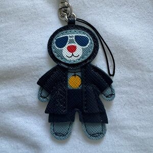 Prada limited edition key chain bear from a fragrance event